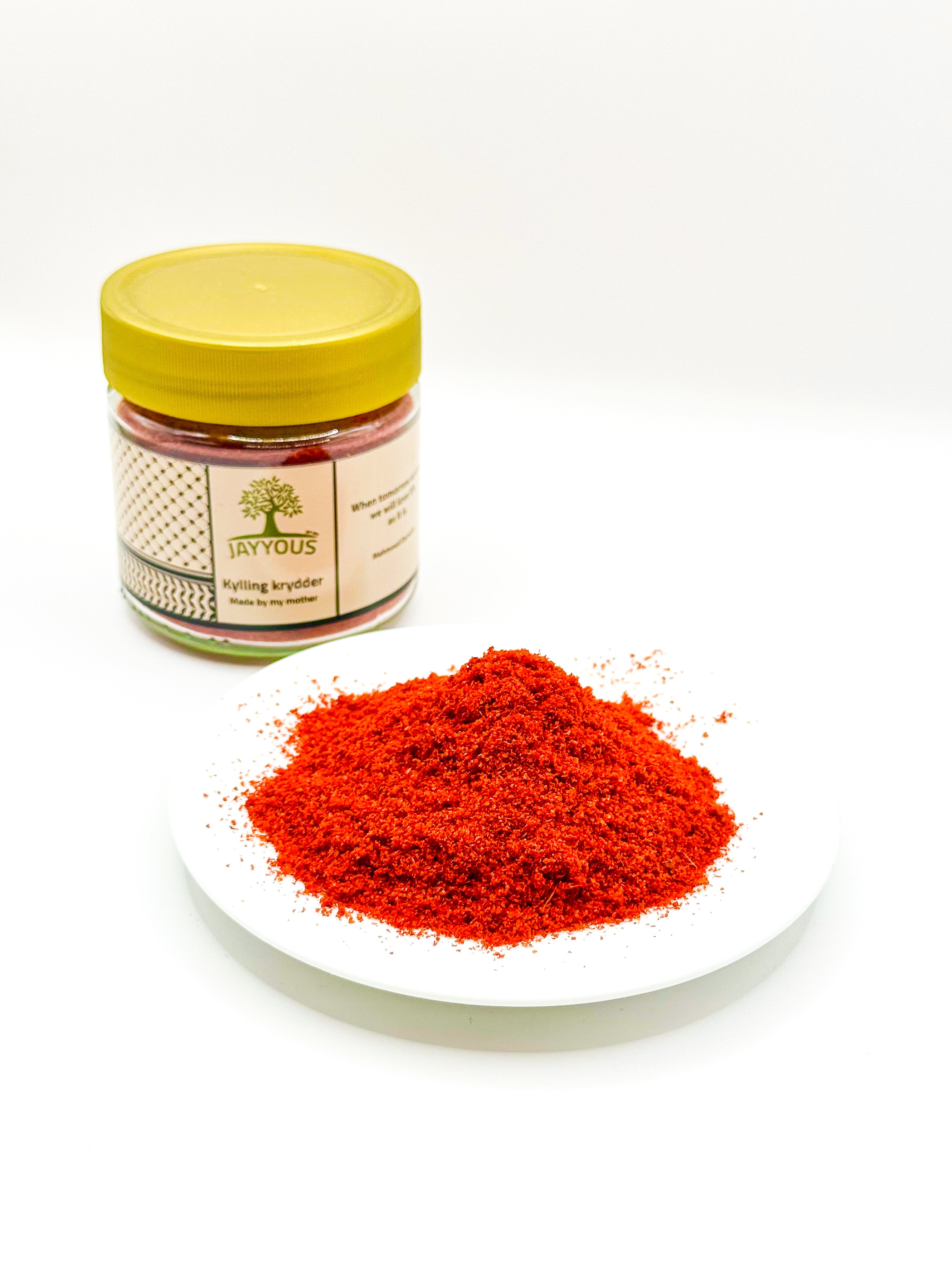 Palestinsk kyllingkrydder i glass med malt krydderpulver