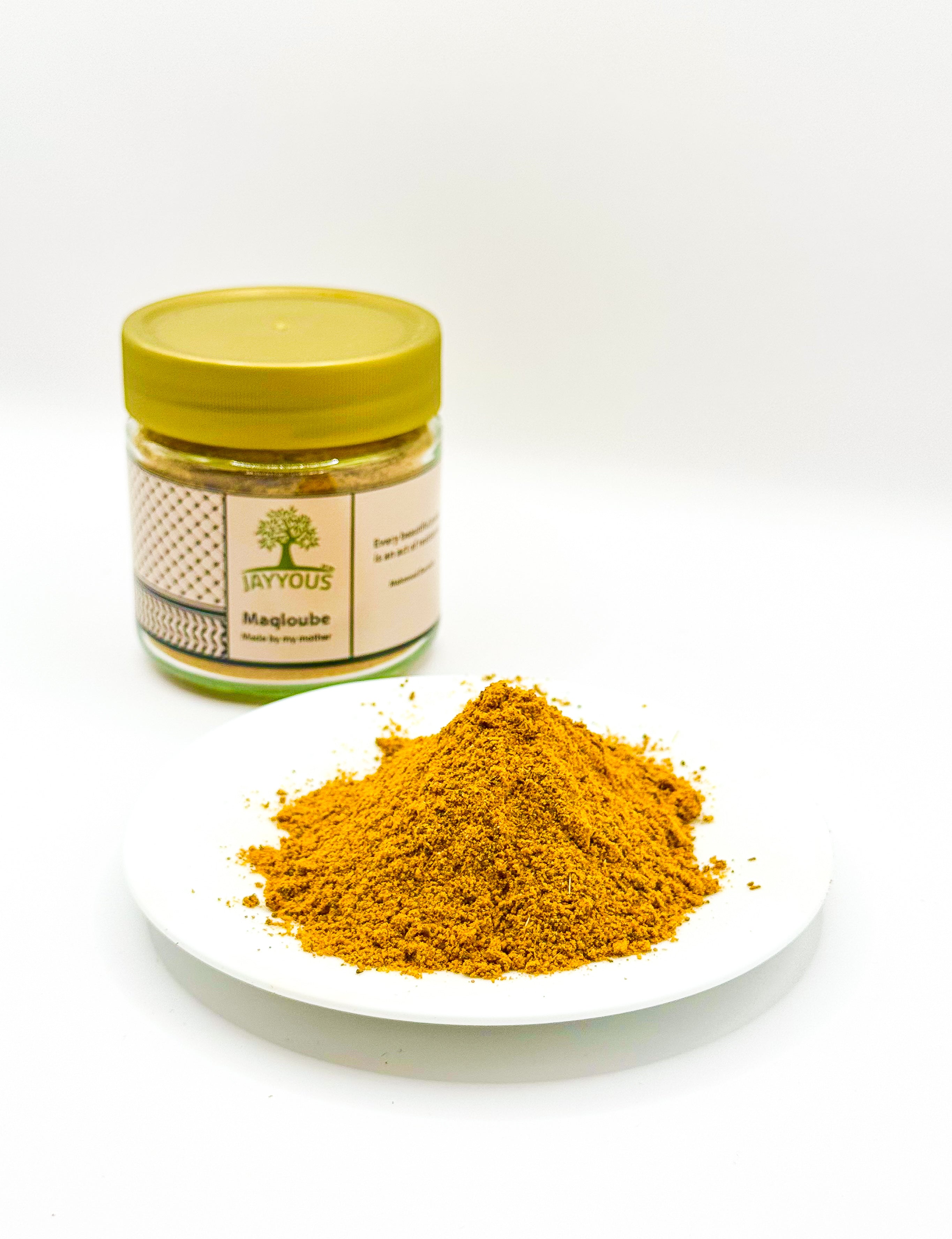 Palestinsk maqlouba- og riskrydder i glass med malt krydderpulver