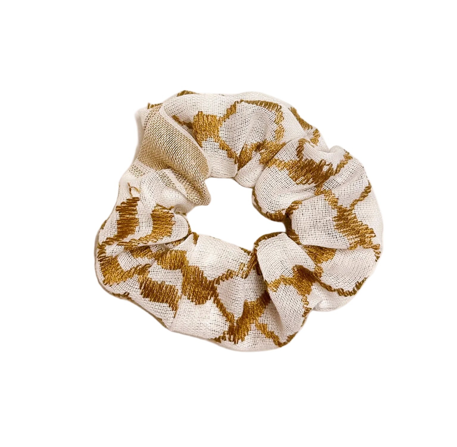 Gul og hvit scrunchie med kufiyeh-mønster, hårstrikk inspirert av tradisjonelt palestinsk design